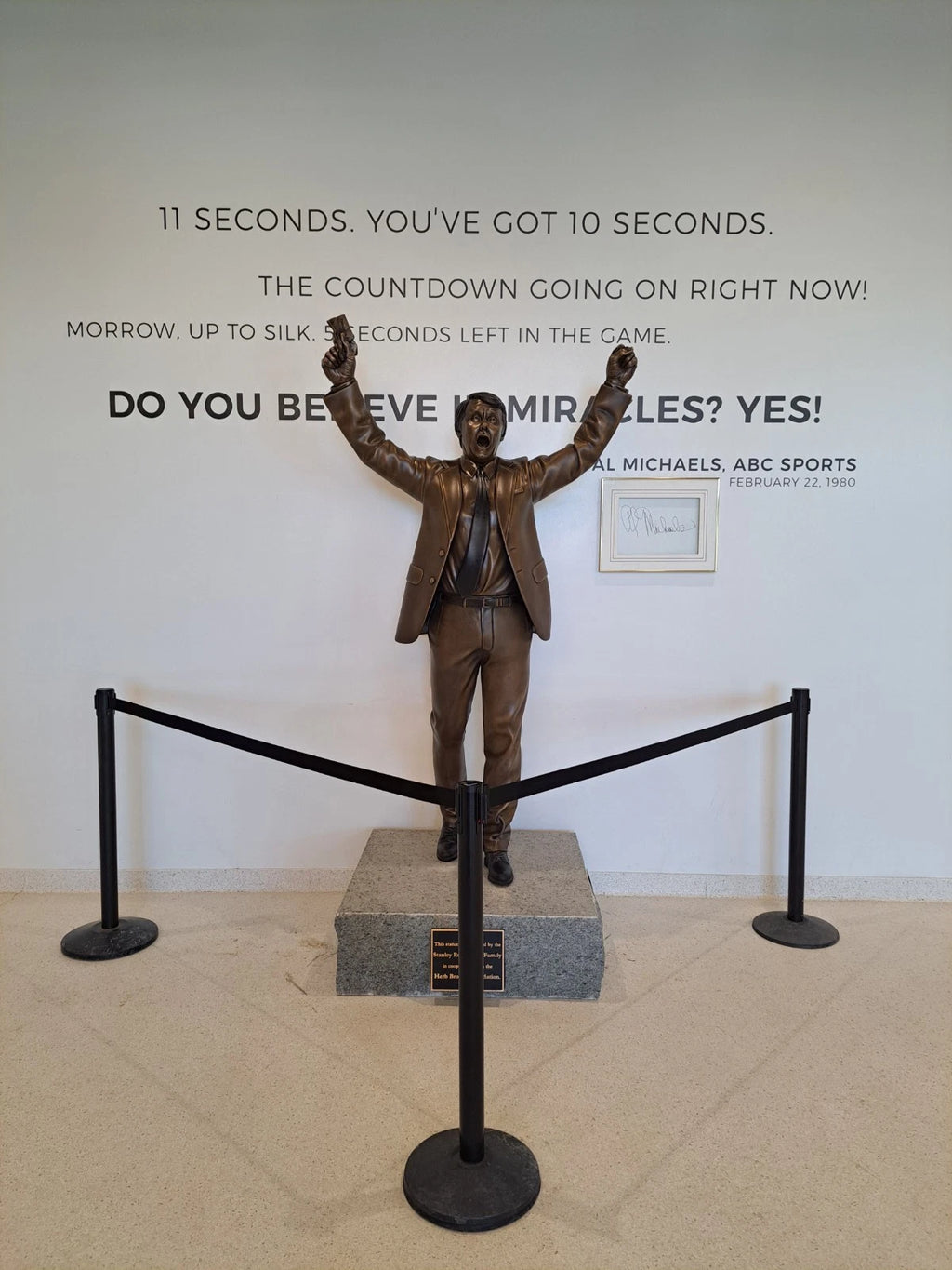 Jack O’Callahan Signed Herb Brooks Statue Unveiling Puck — 2026 — photo 8